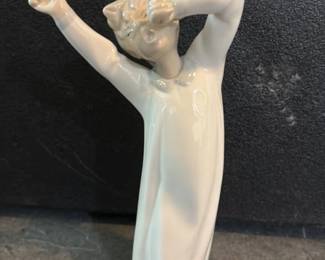Lladro "Boy Awakening" Porcelain Figurine
