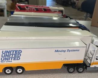 Vintage toy trucks, metal banks