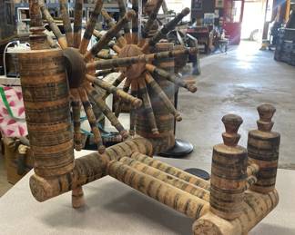 Antique folk art spinning wheel