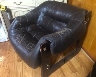 Distressed Vintage Percival Lafer arm chair.