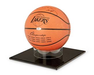 2037
Kobe Bryant Autographed Spalding Rare Lakers Game Ball
The Lakers-embossed basketball with NBA Championship dates, signed and with "24" in black ink, and with a custom display case
9.5" Dia. approximately
With attached Authenticity tag issued by Ace Vintage, No. 24596.
Estimate: $3,000 - $5,000