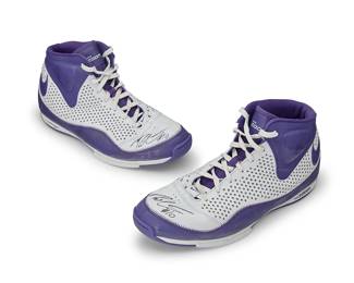 2010
Sasha Vujacic Lakers 2008 Playoff Worn Signed Nike Zoom Shoes
A pair of white leather shoes with purple trim, each shoe signed to toe box with black Sharpie
2 pieces
Size: 15
Accompanied by a Letter of Authenticity from Dan Ceniceros, D.C. Sports Collectibles, Los Angeles, CA, indicating likely playoff worn during Game 1 of the 2008 Western Conference Finals (May 21, 2008 vs. The Spurs).
Estimate: $200 - $400
