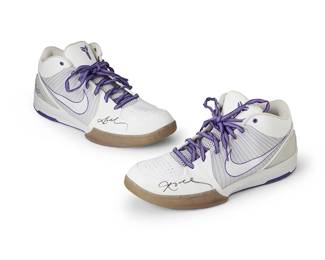 2014
Kobe Bryant Lakers 2009-2010 Autographed Game Worn Nike Zoom Kobe IV Shoes
A pair of Nike Promo Sample shoes in white leather and synthetic panels with purple trim and lacing, with "24" embossed to heel, and each signed in black ink to side front toe box
2 pieces
Size: 14
Accompanied by a Letter of Authenticity issued by DC Sports Collectibles, Los Angeles CA.
Estimate: $20,000 - $25,000