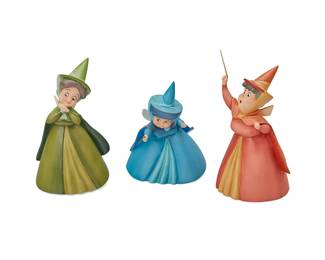 2108
Walt Disney Classics Collection "Three Good Fairies" Figurines from Disney's "Sleeping Beauty"
Circa 1997 & 1998
Comprising three painted porcelain figures, including Merryweather "A Little Bit of Blue" figure in blue, with music stand icon to base for 1997, as well as Flora, "A Little Bit of Pink" figure in orange and yellow, and Fauna "A Little Bit of Both" figure in green, both marked with pickaxe icon to base for 1998, and all with Certificate of Authenticity and original box, 3 pieces
Merryweather: 5.5" H x 4.75" W x 4.5" D; Flora: 7.25" H x 4" W x 4" D; Fauna: 7" H x 4.25" W x 4" D
Estimate: $150 - $200
