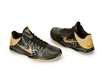 2017
Kobe Bryant Lakers 2010 Autographed Game Issued Road Nike Zoom Finals Edition Kobe V Shoes
A pair of Nike Promo Sample shoes in patterned black with gold and metallic trim and with embedded signature to heel, and each with "24" and signature in silver metallic ink to sides
2 pieces
Size: 14
Accompanied by a Letter of Authenticity from Dan Ceniceros, D.C. Sports Collectibles, Los Angeles, CA
Estimate: $20,000 - $25,000