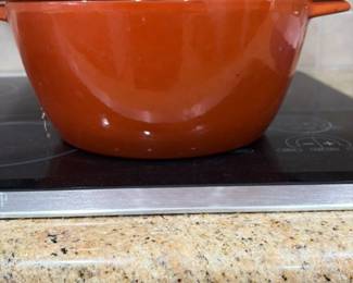 Orange Enameled Cast Iron Dutch Oven