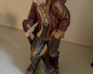 Carved Wooden Figurine of a Hunter