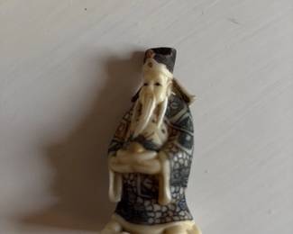 Vintage Carved Figurine with "Prosperity" Inscription
