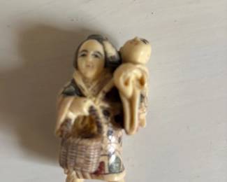 Antique Japanese Netsuke of a Woman Carrying a Child
