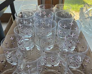 Set of vintage mid-century modern glasses with an atomic starburst pattern