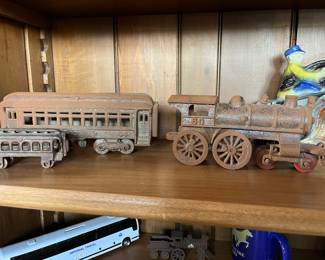 Antique cast iron toy train engine and caboose
