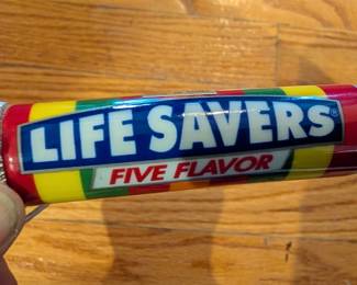 Porcelain Lifesaver Box with tiny red lifesaver inside.