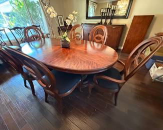 American Drew Advocate Series dining table, lighted hutch and granite-top buffet available for presale. Call 562-254-2597 for details.
