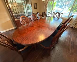 American Drew Advocate Series dining table, lighted hutch and granite-top buffet available for presale. Call 562-254-2597 for details.