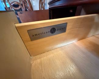 American Drew Advocate Series dining table, lighted hutch and granite-top buffet available for presale. Call 562-254-2597 for details.
