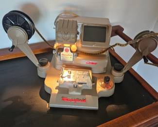 Operational antique 8mm reel editor with bulk antique movies $150 all