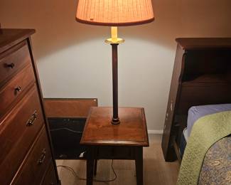 I like it when they combine a lamp and a table.
$125