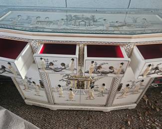 White laquer and abalone Asian cabinet , with matching mirror and corner cabinet
$150