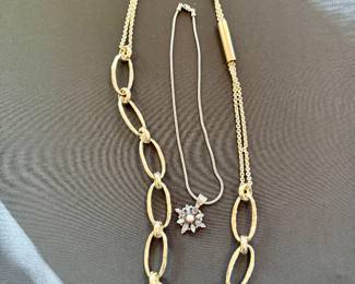 Leo Feeney pendant with semi-precious stones and silver chain (center)