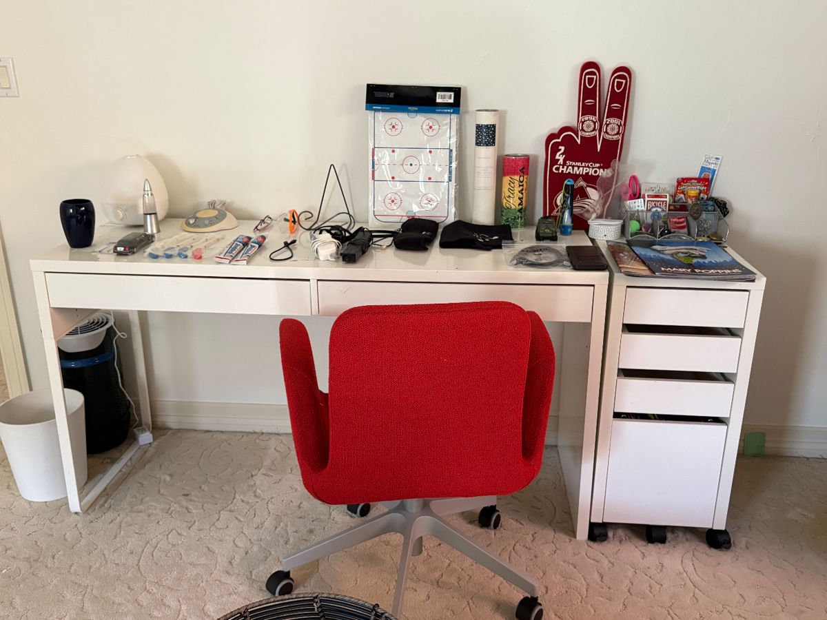 Desk or vanity
Red roller desk chair