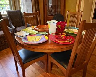 Stickley round dining table and chairs