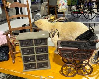 Antique rocking chair, chest of drawers, polar bear, baby vintage baby buggy