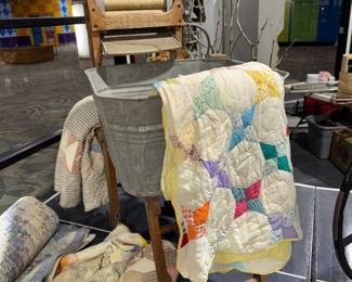 Antique washing basin, antique quilts
