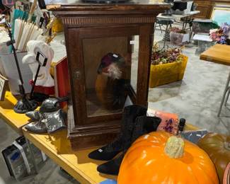 Display cabinet, pumpkins, antique shoes