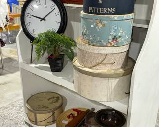 Hat boxes, clock
