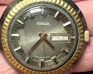 Soviet Raketa (Пакета) wristwatch, and it’s a beautiful example of a “TV Case” Raketa Day-Date Automatic, likely from the 1970s