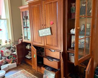 Three piece entertainment center features collectibles, TV, CDs, DVDs, records and more.