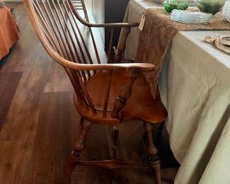 Two Windsor style armchairs and six regular dining chairs