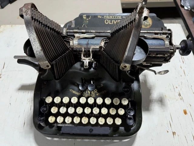Oliver batwing typewriter. https://modestlambestatesales.hibid.com/