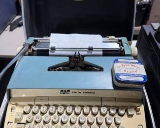 Smith - Corona portable electric typewriter. https://modestlambestatesales.hibid.com/