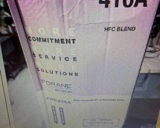 Forane 410A refrigerant. https://modestlambestatesales.hibid.com/