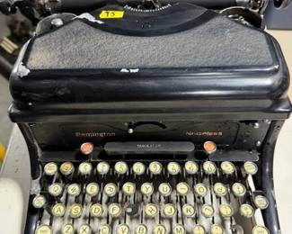 Antique Remington typewriter. https://modestlambestatesales.hibid.com/