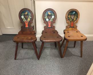 Antique hand carved and painted Hungarian chairs.