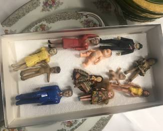Miniature vintage toys and dolls.