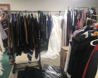 Clothing including a wedding dress.