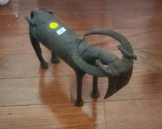 Metal African sculpture.