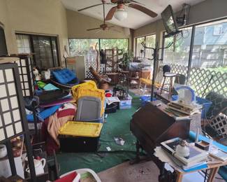 Porch full of treasures. Being sorted