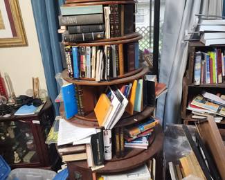 Unusual circular bookcase $500