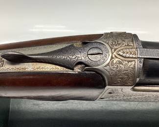 1964 EIG ITALIAN IMPORTED OVER UNDER 20 GA SHOTGUN 1964 EIG BRESCIA ITALY GARDONE V.T. REGION. THIS SHOTGUN IS A 20 GAUGE MAGNUM 3 INCH CHAMBERED. WONDERFUL METAL ENGRAVED OVER AND UNDER SHOTGUN. LOW ROUNDS PASSED THRU THE BARRELS. SIGNS OF WEAR ON THE STOCK AND PLASTIC BUTT PLATE IS CRACKED BEYOND REPAIR. SIMPLE FIX. FFL OR NICS CHECK REQUIRED