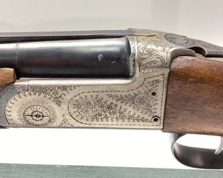 1964 EIG ITALIAN IMPORTED OVER UNDER 20 GA SHOTGUN 1964 EIG BRESCIA ITALY GARDONE V.T. REGION. THIS SHOTGUN IS A 20 GAUGE MAGNUM 3 INCH CHAMBERED. WONDERFUL METAL ENGRAVED OVER AND UNDER SHOTGUN. LOW ROUNDS PASSED THRU THE BARRELS. SIGNS OF WEAR ON THE STOCK AND PLASTIC BUTT PLATE IS CRACKED BEYOND REPAIR. SIMPLE FIX. FFL OR NICS CHECK REQUIRED