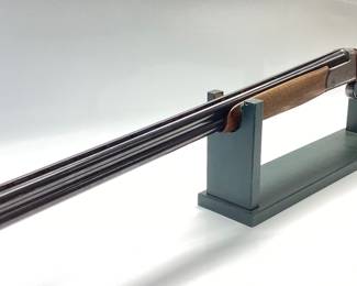 1964 EIG ITALIAN IMPORTED OVER UNDER 20 GA SHOTGUN 1964 EIG BRESCIA ITALY GARDONE V.T. REGION. THIS SHOTGUN IS A 20 GAUGE MAGNUM 3 INCH CHAMBERED. WONDERFUL METAL ENGRAVED OVER AND UNDER SHOTGUN. LOW ROUNDS PASSED THRU THE BARRELS. SIGNS OF WEAR ON THE STOCK AND PLASTIC BUTT PLATE IS CRACKED BEYOND REPAIR. SIMPLE FIX. FFL OR NICS CHECK REQUIRED