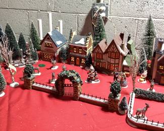9 PC DICKENSâ€™ VILLAGE COLLECTION CHRISTMAS DECOR HERITAGE VILLAGE COLLECTION WITH LIGHTS INCLUDING CHARLES DICKENS CHRISTMAS CARROL VILLAGE, ADDITIONAL HVC MINIATURES AND FLOCKED LANDSCAPE AND WINDOW LIGHTED CANDLES. COMPLETE CHRISTMAS VILLAGE DECORATION IN ONE LOT. VILLAGE HAVE ORIGINAL BOXES