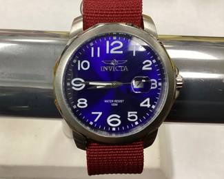 INVICTA WATCH MODEL 6607 BLUE DIAL WITH MAGNIFIED DATE WINDOW AND CANVAS BAND