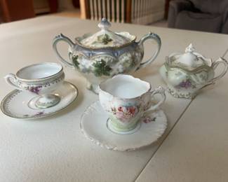 Extensive selection of antique hand-painted porcelain by R.S. Prussia and others.