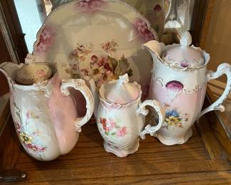 Extensive selection of antique hand-painted porcelain by R.S. Prussia and others.