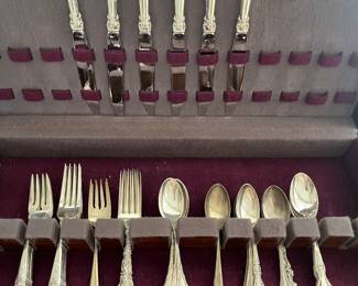Fifty-two pieces of sterling silver flatware by various makers.